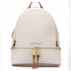 Michael Kors Rhea Zip Md convertible backpack with cardholder in Vanilla.